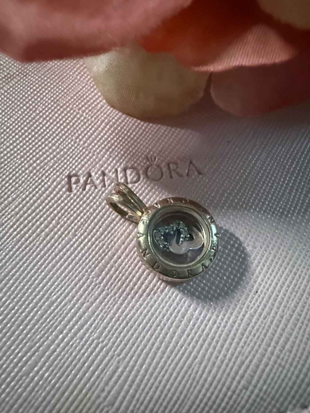 Pandora gold tone floating charm locket with silver heart